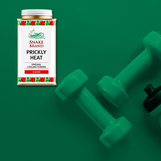 A tin of snake brand pictured next to gym weights